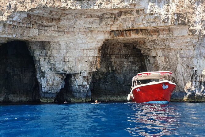 Blue Cave & Vis Island speedboat tour from Hvar - Stop 4, Stiniva Cove: The Boat-Only Bay Under Huge Cliffs