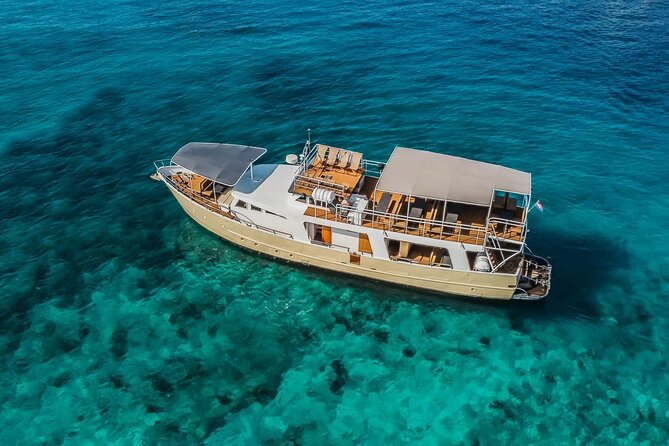 Blue Lagoon and 3 Island Boat Tour with Food and Drinks Included - Stop 1 on Šolta: Nečujam wreck views and a swim-ready start