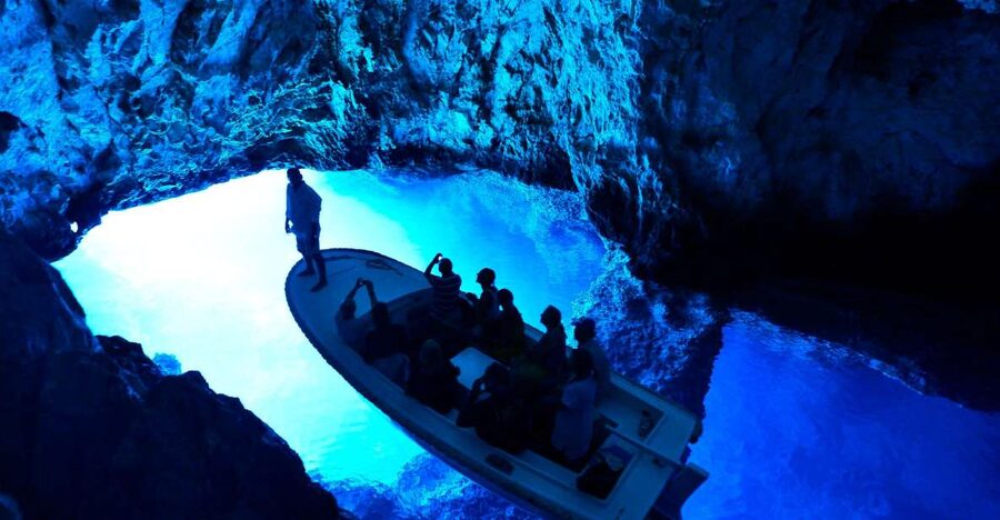 From Hvar: Blue and Green Cave Day Tour - Green Cave (Ravnik Island): emerald glow and real swim time