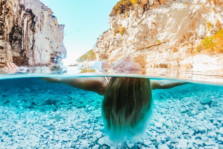 From Hvar: Blue and Green Cave Day Tour - Budikovac Blue Lagoon: clear turquoise water and easy floating
