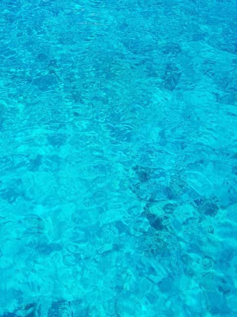 From Hvar: Blue cave group speedboat tour full day - Entering the Blue Cave: what it feels like and why photos work