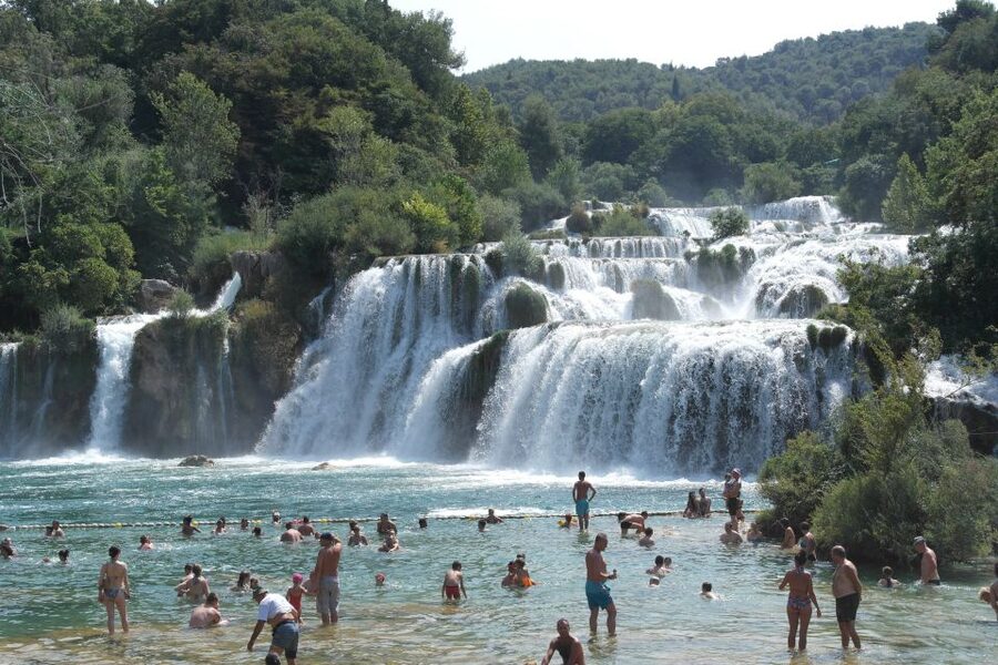 From Omiš: Krka Waterfalls and Trogir Small Group Tour - Skradinski Buk: Travertine Cascades and Wooden Bridges