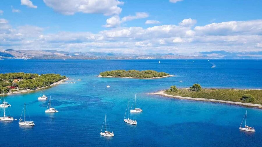 From Split: Blue Lagoon and 3 Island Boat Tour - Krknjaši Bay Blue Lagoon: Your First Real Swim and Snorkel Hour