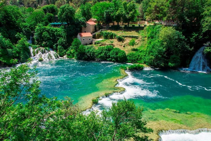 From Split: Krka Waterfalls Tour with Boat Ride & Swimming - Skradin: cobblestone strolling and the swim beach option