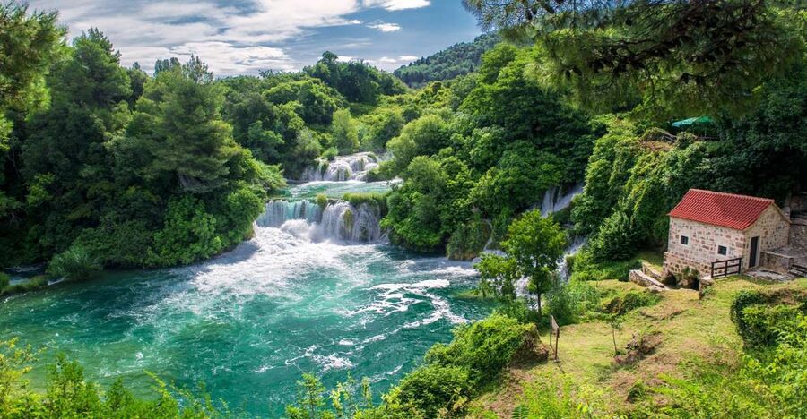 From Split: Krka Waterfalls Tour with Boat Ride & Swimming - Skradinski Buk: the guided water mills and ethno village start