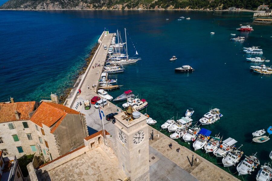 From Split: Private Day Trip to Blue Cave and Islands - Hvar Old Town with Protective Walls and Red Roofs