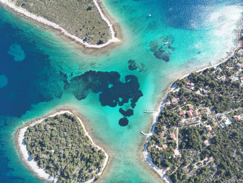 From Split: Trogir & Blue Lagoon Boat Tour with Snorkeling - Labadusa Beach and Ciovo Bay: relaxing, pebbles, and pine-forest views