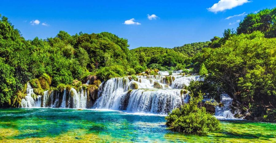 From Split & Trogir: Krka Waterfalls Day Tour with Boat Ride - Skradin time: walking, swimming, and eating without pressure