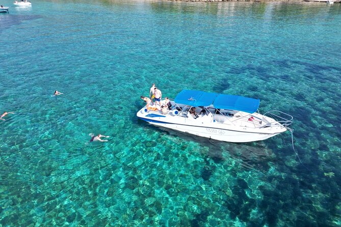 From Trogir & Split: Half Day Speedboat Tour with Blue Lagoon - What happens on board, from snorkeling gear to the vibe