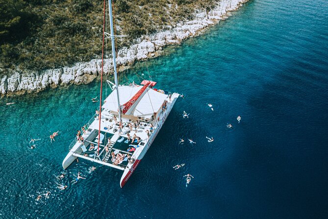 Full-Day Catamaran Cruise to Hvar & Pakleni Islands with Food and free Drinks - Brac Island Swim Stop: Your First Taste of the Adriatic