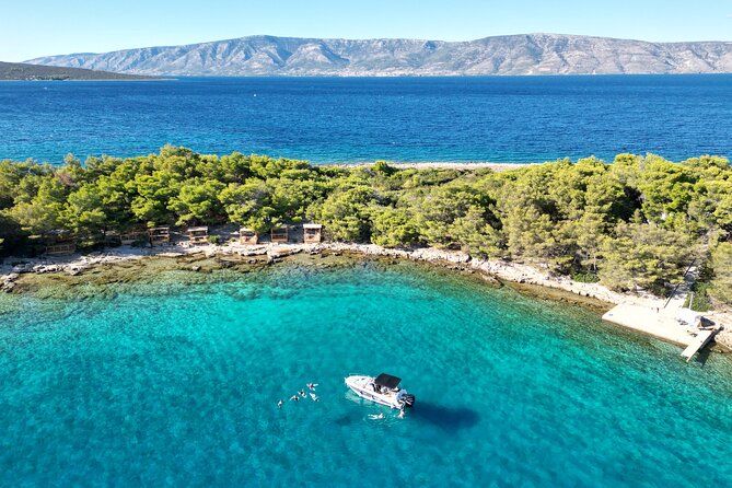 Golden Horn Beach & North Shore of Hvar Island Private Boat Tour - Stop 1: Zlatni Rat (Golden Horn) on Brac, where famous meets swim-friendly