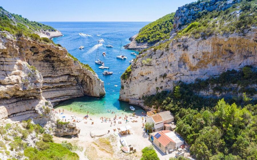Hvar:Blue & Grenn Cave and Vis Island Private Speedboat Tour - Stiniva cove: that cliff view is the whole point
