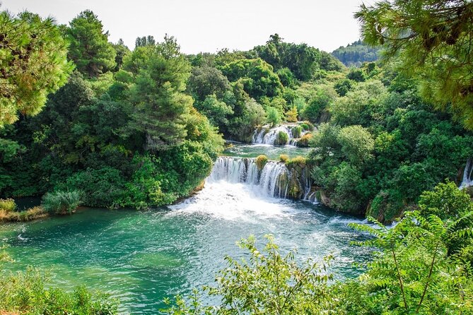 Krka Waterfalls and wine tasting Tour from Split or Trogir - Roški slap swimming and relaxing, plus the konoba lunch option