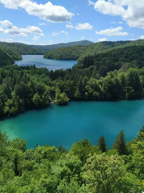 Plitvice Lakes: Guided Walking Tour with Train and Boat Ride - The panoramic train return: tired legs, still-good views
