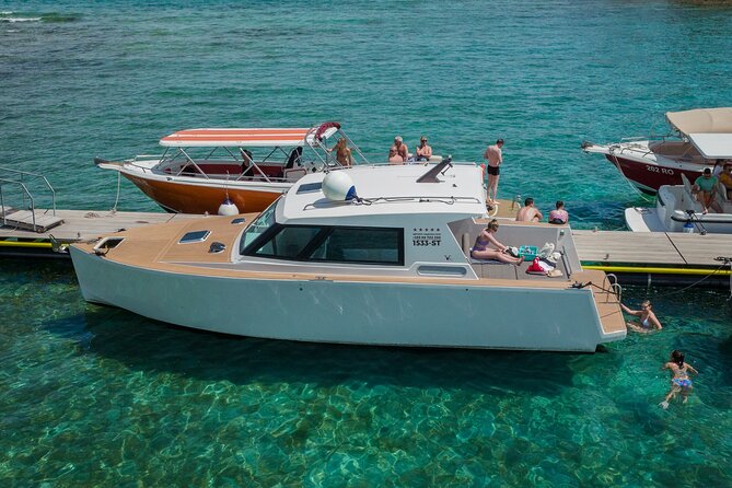 Private Red Rocks and Pakleni Islands beach hopping speedboat tour - Stop 1: Dubovica Beach and the Red Rocks of Hvar Swim
