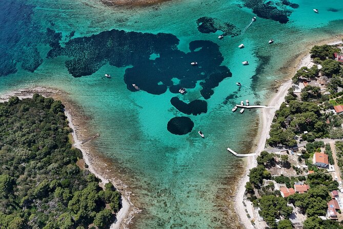 Private Tour from Split: Blue Lagoon & 3 Islands + Wine Included - Stop 2: Blue Lagoon (Krknjasi Bay) for Snorkeling, Swimming, and Beach-Bar Breaks