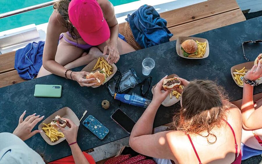Split: Blue Lagoon and 3 Island Cruise with Food and Drinks - Lunch and Drinks: Donuts, Burgers, and Unlimited Wine