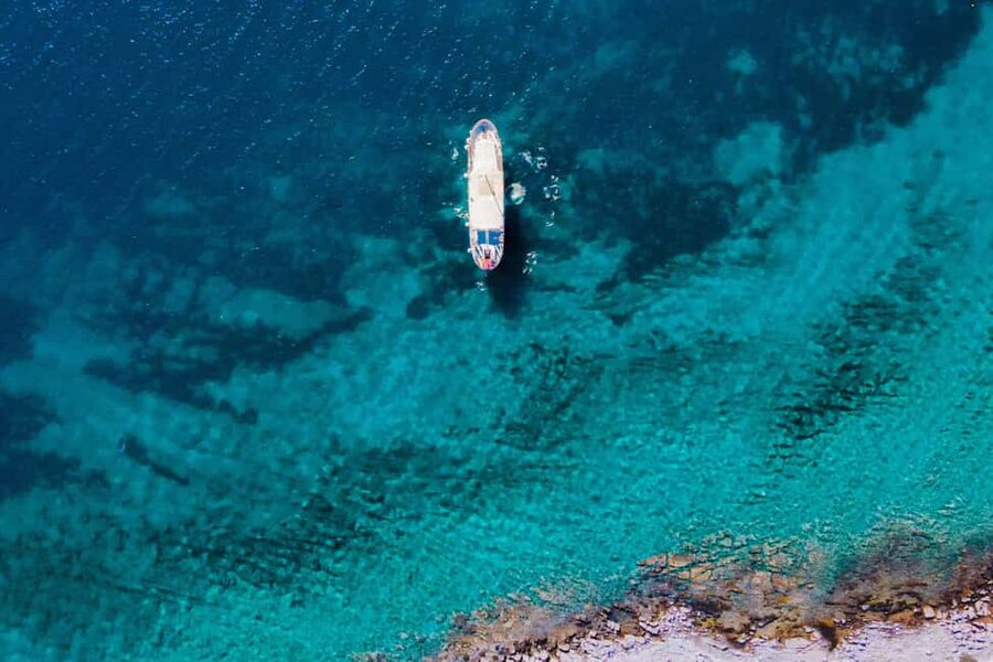 Split: Blue Lagoon Boat Party with Slide, Dj and After Party - Price Value: How $45 Adds Up When Drinks and Food Are Separate