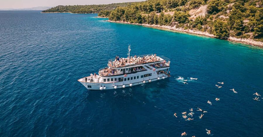 Split: Blue Lagoon, Shipwreck and Šolta with Food and Drinks - Blue Lagoon on Drvenik Veliki: beach lunch, pine shade, and real swimming