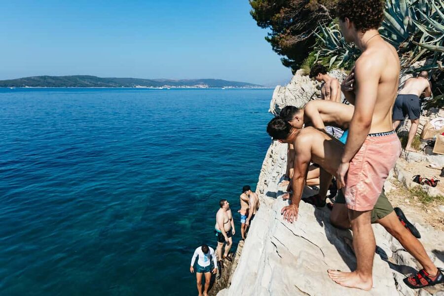 Split: Cliff Jumping & Deep Water Solo Tour - Warm-up climbs first, then routes that match your comfort