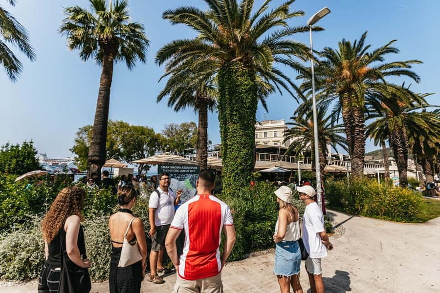 Split: Diocletian Palace & Old Town Guided Walking Tour - Finding Apodos Travel Agency and the red bus pickup