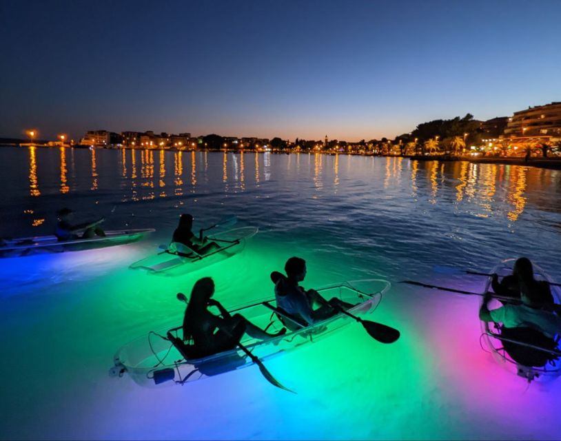 Split: Illuminated Evening Guided Kayaking Tour - Back on the sea near cliffs and white rocks