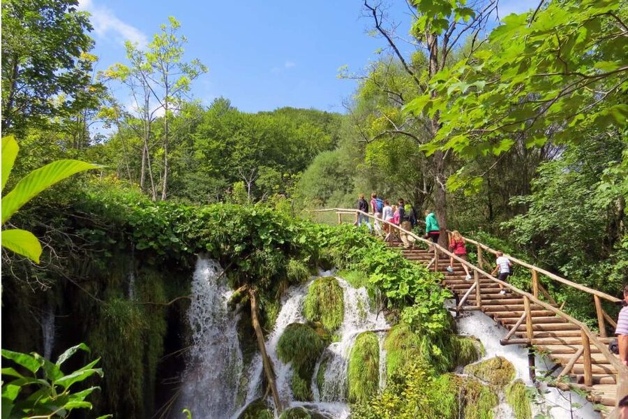 Split: Plitvice Lakes Guided Day Tour with Entry Tickets - Upper Lakes walk: wooden trails, turquoise views, and a steady group pace