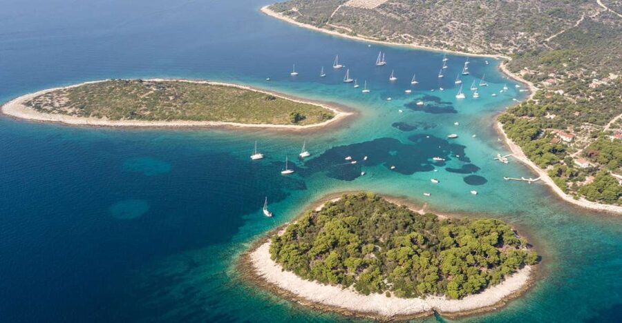 Split: Private Full Day Boat Trip to Blue Lagoon and Trogir - Trogir: coffee on the promenade and time to change into swim mode